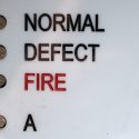 Image of indicator lights labeled Normal, Defect, and Fire